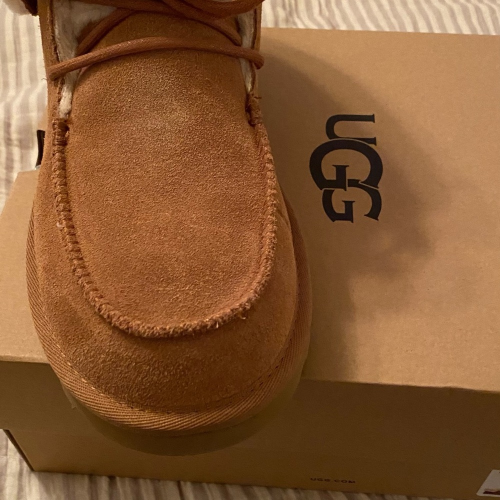 Woman’s Ugg booties size 10 never been worn. Brand new